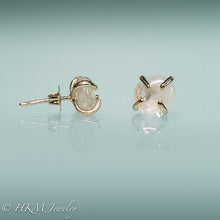 Load image into Gallery viewer, close up side view of medium size prong set tumble polished cape may diamond stud earrings in 14k yellow gold with butterfly back by hkm jewelry