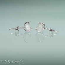 Load image into Gallery viewer, close up side of prong set tumble polished cape may diamond stud earrings in sterling by hkm jewelry