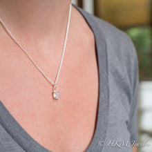 Load image into Gallery viewer, model wearing small prong set tumble polished cape may diamond necklace by HKM Jewelry