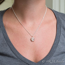 Load image into Gallery viewer, model wearing medium prong set tumble polished cape may diamond necklace by HKM Jewelry
