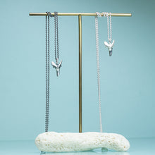 Load image into Gallery viewer, cast sterling silver fossilized sand tiger shark tooth necklaces on cable chain and brass and coral display by hkm jewelry