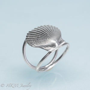 close up angled bottom view of large scallop shell ring on a double band in sterling silver by hkm jewelry