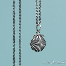 Load image into Gallery viewer, detail close up of small scallop shell necklace in oxidized sterling silver by hkm jewelry
