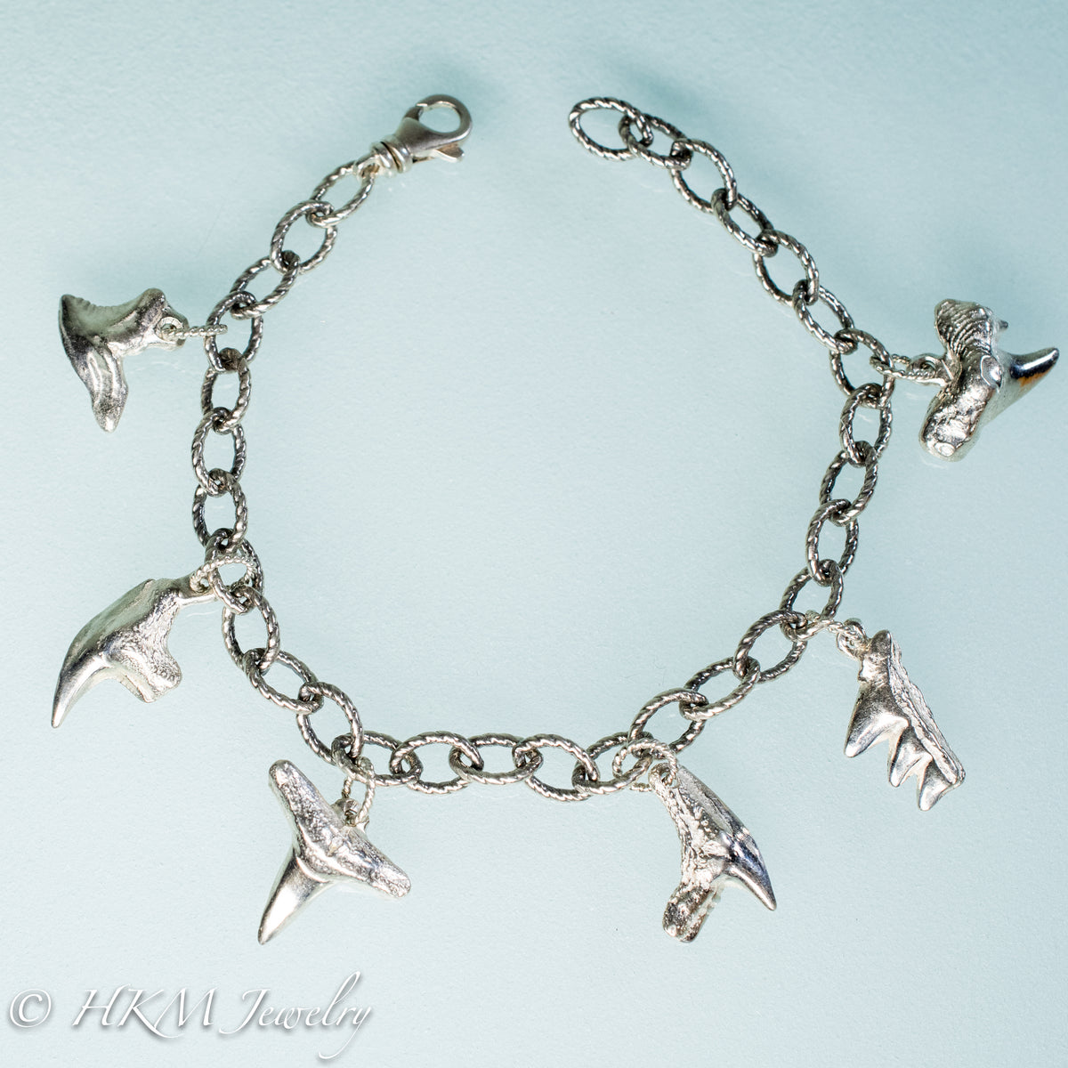 Tooth clearance charm bracelet