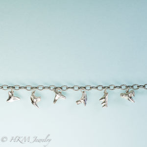 cast silver shark tooth bracelet with fossilized sharks teeth by hkm jewelry
