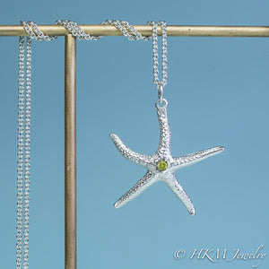 silver starfish necklace with peridot gemstone August birthstone by HKM Jewelry