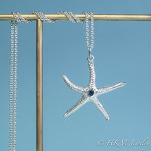 Load image into Gallery viewer, silver starfish necklace with sapphire gemstone September birthstone by HKM Jewelry