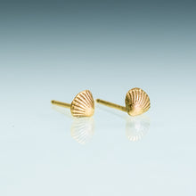 Load image into Gallery viewer, tiny gold seashell studs on light blue background

