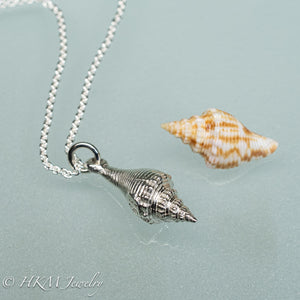 polished silver fl fighting conch necklace and shell by hkm jewelry
