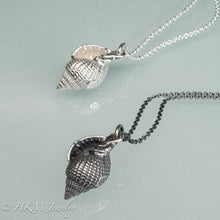 Load image into Gallery viewer, cast silver sanibel nutmeg shell necklaces in polished and oxidized finishes by hkm jewelry 
