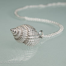 Load image into Gallery viewer, close up view of cast silver nutmeg shell necklace in a polished finish by hkm jewelry
