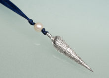 Load image into Gallery viewer, Silver cone-shaped ornament with a pearl on a blue ribbon against a light gray background
