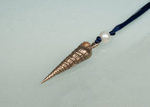 Load image into Gallery viewer, Decorative pendant with a pearl on a blue cord against a light gray background
