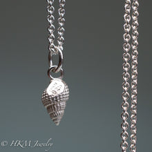 Load image into Gallery viewer, backside of tritia trivittata - Threeline Mud Snail cast in silver by hkm jewelry
