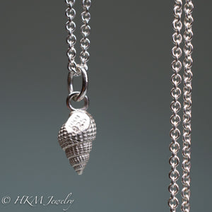backside of tritia trivittata - Threeline Mud Snail cast in silver by hkm jewelry