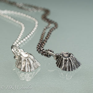 close up bottom view of cast silver barnacle necklace in both polished and oxidized finish by hkm jewelry