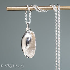 cast atlantic bubble shell bulla striata necklace in polised sterling silver by hkm jewelry