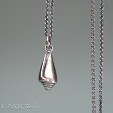 Load image into Gallery viewer, front close up view of florida cone snail necklace in oxidized silver finish by hkm jewelry
