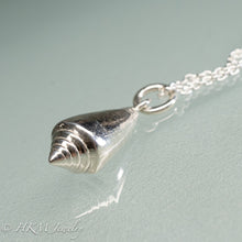 Load image into Gallery viewer, top view of florida cone snail necklace in polished silver finish by hkm jewelry
