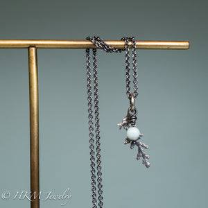 cast silver cypress bough and amazonite necklaces by hkm jewelry in oxidized finish