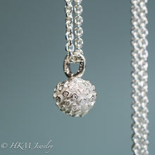 Load image into Gallery viewer, close up of cast silver kousa dogwood fruit necklace by hkm jewelry in polished finish
