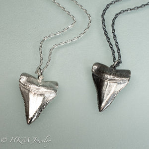 cast silver great white shark tooth necklaces in polished and oxidized finishes by hkm jewelry