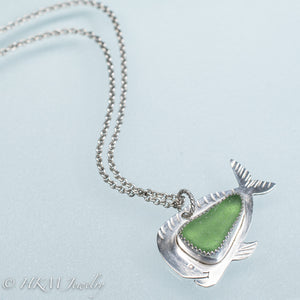 mahi mahi dolphin fish necklace by hkm jewelry in recycled sterling silver and serrated bezel set green sea glass piece and cable chain