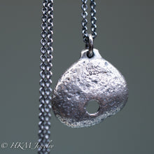 Load image into Gallery viewer, back of hag stone necklace cast in sterling silver by hkm jewelry in oxidized finish
