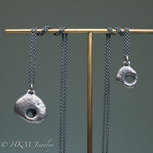 Load image into Gallery viewer, small and large sized hag stone necklaces cast in sterling silver by hkm jewelry in oxidized finish
