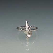 Load image into Gallery viewer, silver horse conch shell ring with twisted band on gradient blue background
