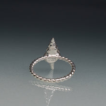 Load image into Gallery viewer, underside of silver horse conch shell ring with twisted band on gradient blue background
