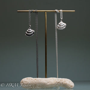 lirophora latilirata - Imperial Venus Clam shell necklaces in recycled silver on brass and coral earring stand