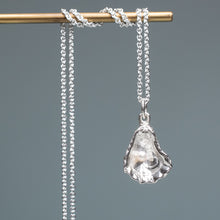 Load image into Gallery viewer, Silver pendant necklace on a gray background hkm jewelry oyster pearl necklace kittens paw
