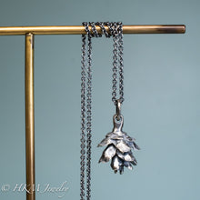 Load image into Gallery viewer, cast silver hemlock pine cone necklace by hkm jewelry in oxidized finish
