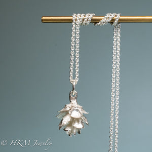cast silver hemlock pine cone necklace by hkm jewelry in polished finish