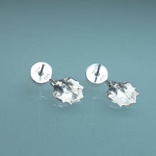 Load image into Gallery viewer, underside of back view of cast silver mantis shrimp tail and pearl two tier dangle earrings on blue background
