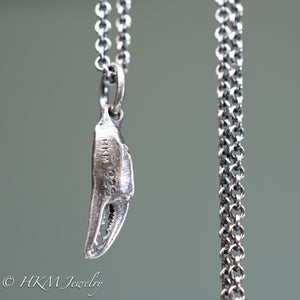 back view of mini lady crab claw necklace cast in recycled silver in an oxidized finish by hkm jewelry