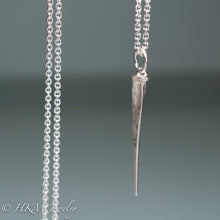 Load image into Gallery viewer, close up of mini horseshoe crab tail necklace in sterling silver by hkm jewelry

