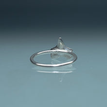 Load image into Gallery viewer, underside view of cast silver small shark tooth ring on blue gradient background
