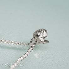 Load image into Gallery viewer, top view of mini bay scallop necklace with pearl inset by hkm jewelry
