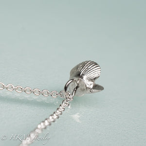 top view of mini bay scallop necklace with pearl inset by hkm jewelry