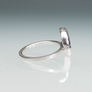 square band view of cast sterling silver rams horn squid spirula shell spiral ring by hali maclaren of hkm jewelry