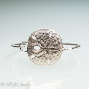 molded and cast real sand dollar cuff bracelet in recycled sterling silver by hkm jewelry