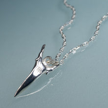 Load image into Gallery viewer, back side view of silver shark tooth necklace on anchor chain with light blue background
