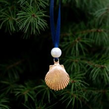 Load image into Gallery viewer, cast bronze shell from cape may NJ scallop ornament with freshwater pearl and navy blue satin ribbon by hkm jewelry
