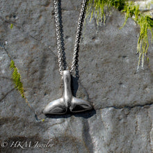 Load image into Gallery viewer, top side of silver dolphin tail necklace by hkm jewelry 
