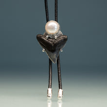 Load image into Gallery viewer, delicate unisex bolo tie with shark tooth fossil and freshwater pearl on thin leather cord
