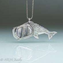 Load image into Gallery viewer, sperm whale necklace by hkm jewelry in recycled sterling silver and bezel set fossil clam shell piece hammer textured details and hand sawn 
