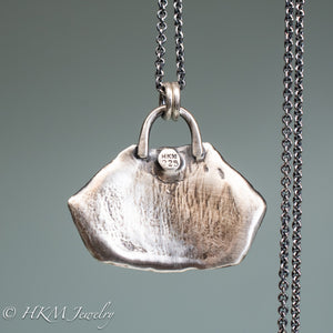 back view of Diamondback terrapin turtle shell scute necklace in oxidized finish by hkm jewelry 