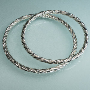 side view of sterling silver twist rope bangles by hkm jewelry